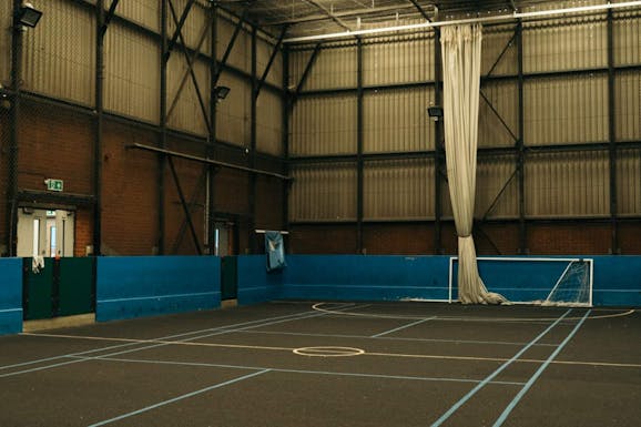 The Downside Settlement Court | Hard (macadam) netball court