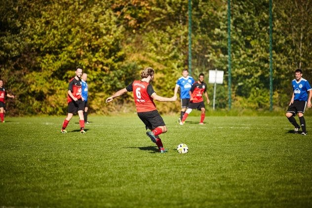 friends_playing_football