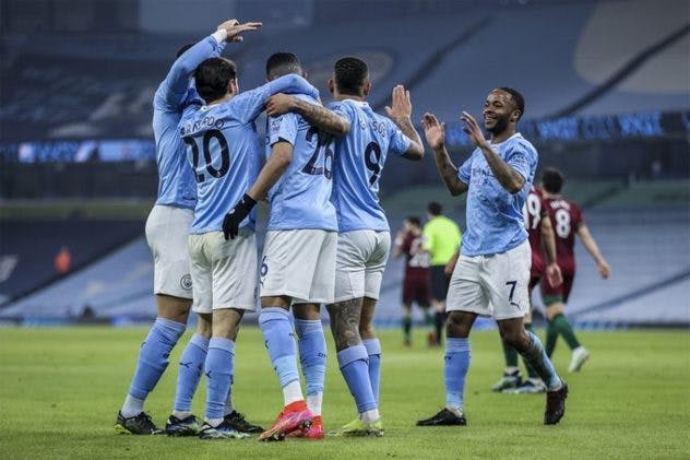 Man City football team celebrate